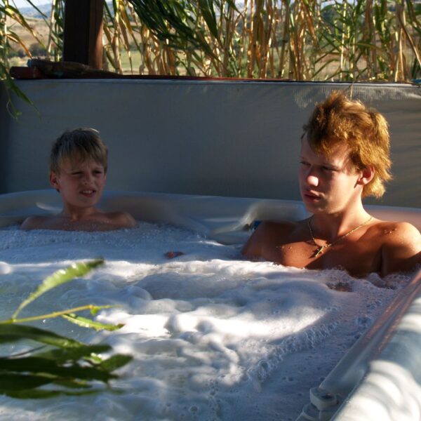 Boys enjoying hot tub