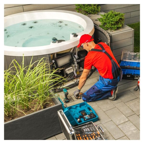 Technician repairing hot tub with tools