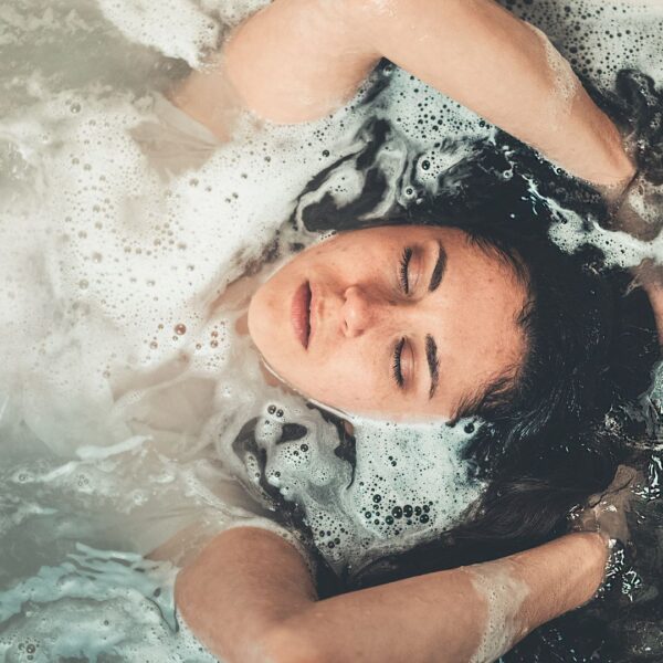woman relaxing in a hot tub
