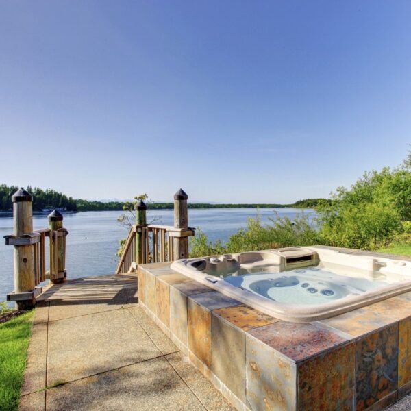 hot tub overlooking a lake or ocean 