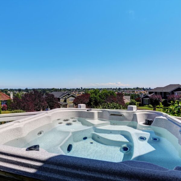 modern hot tub on deck overlooking neighborhood