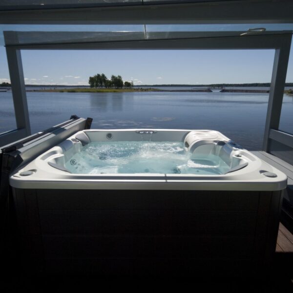 hot tub on deck overlooking water